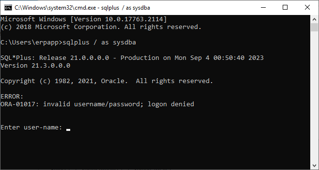 ORA-01017 sqlplus / as sysdba in Windows